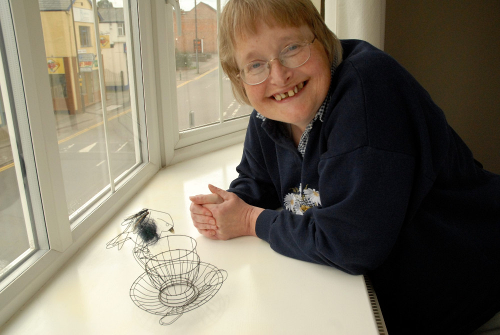 Sue with bird by Cathy Miles.jpg